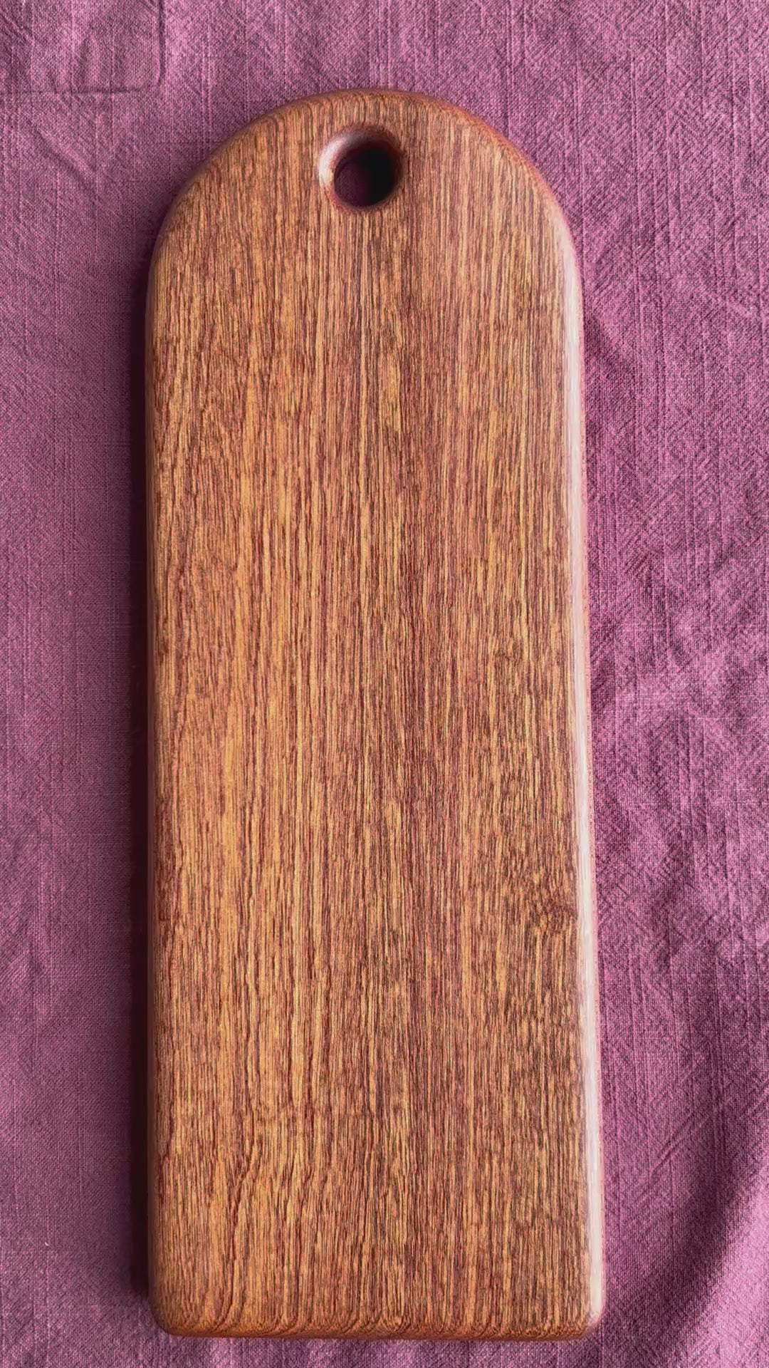 Video of a sapele food serving board
