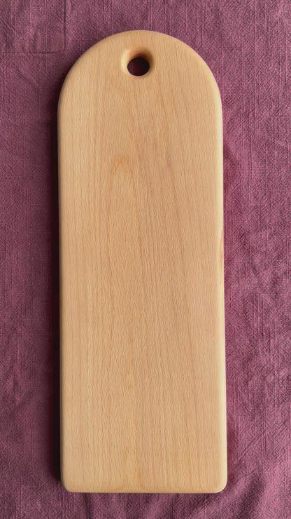 Video of a beech wood food serving board